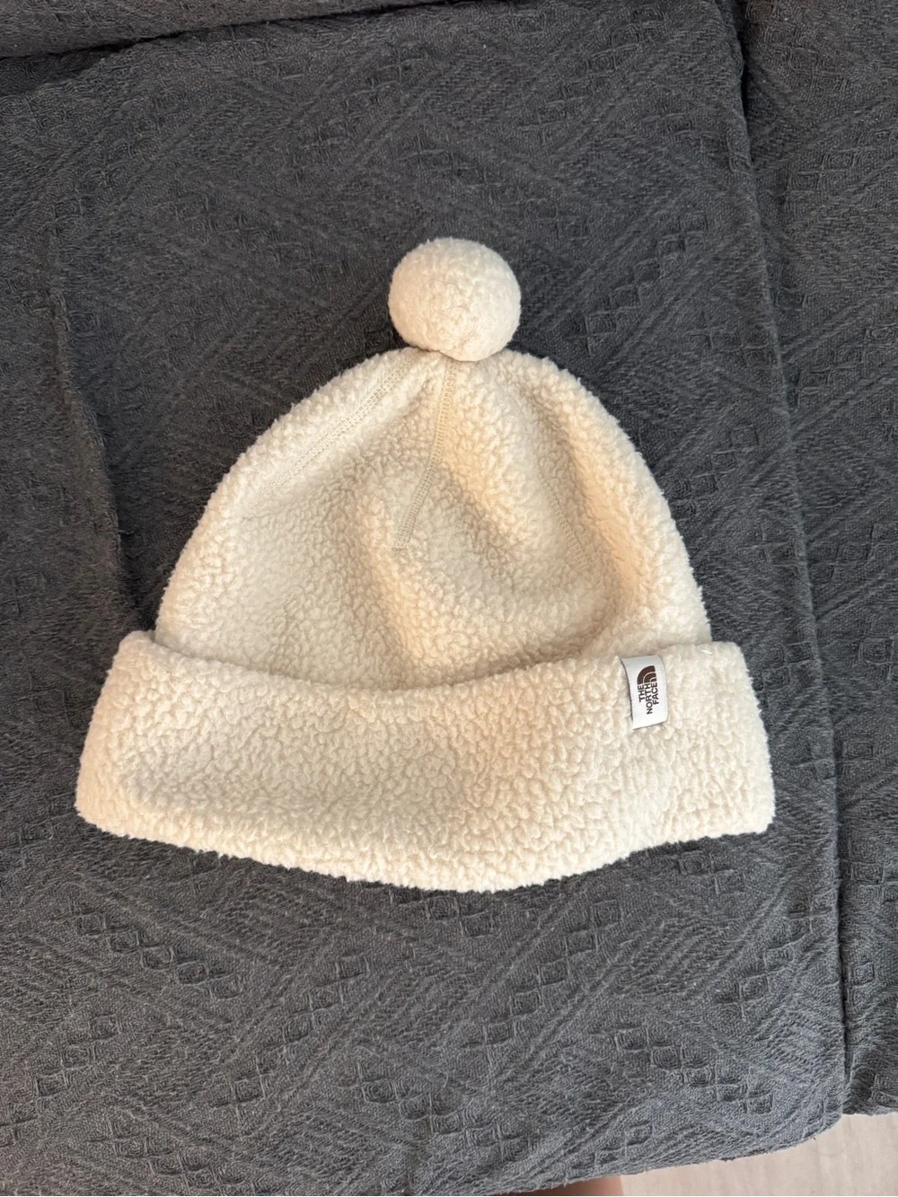 The North Face unisex Cream Sherpa Pom Beanie